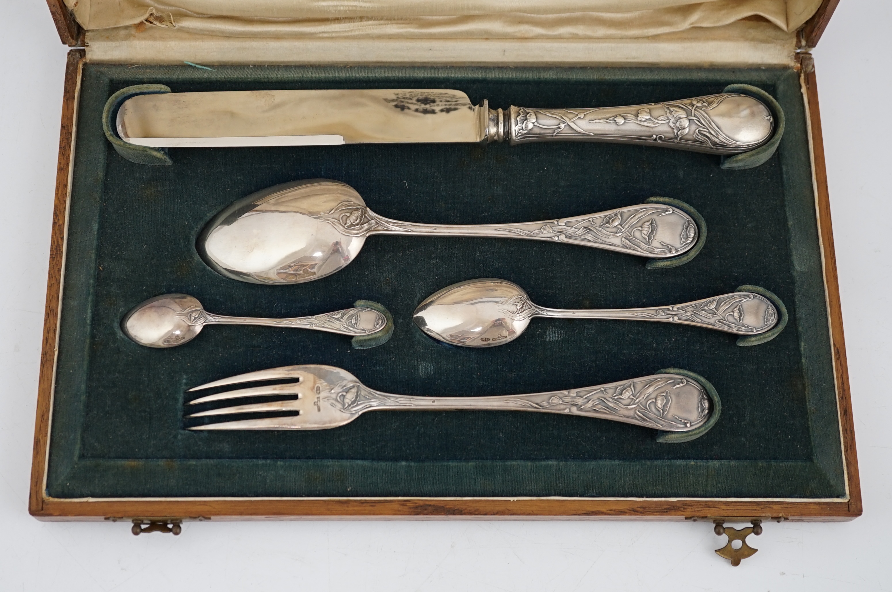 An early 20th century Russian 84 zolotnik silver five piece personal cutlery set by Ivan Khlebnikov